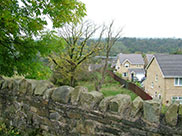 New houses, you can just make out the M65 motorway in the distance