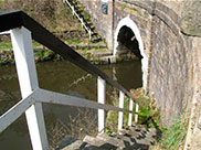 Steep steps leading down to tunnel entrance