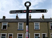 Signpost showing 8 miles to Barnoldswick