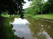 The canal winds away from the main road