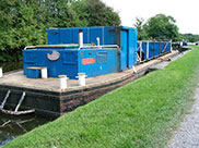 A maintenance boat named 'Wigan'
