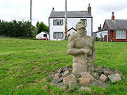 A stone sculpture at Halsall Warehouse bridge