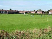 A local football match by the canal