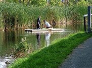 Kids on a makeshift raft