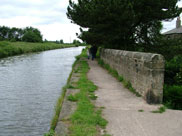 A canal bridge over a narrow road