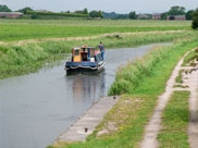 Narrow boat heading towards Rufford