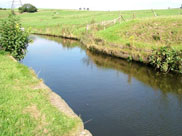 Very high towpath, looking down at the canal