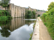 Stone-built canalside industrial buildings