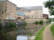 Stone-built canalside industrial buildings
